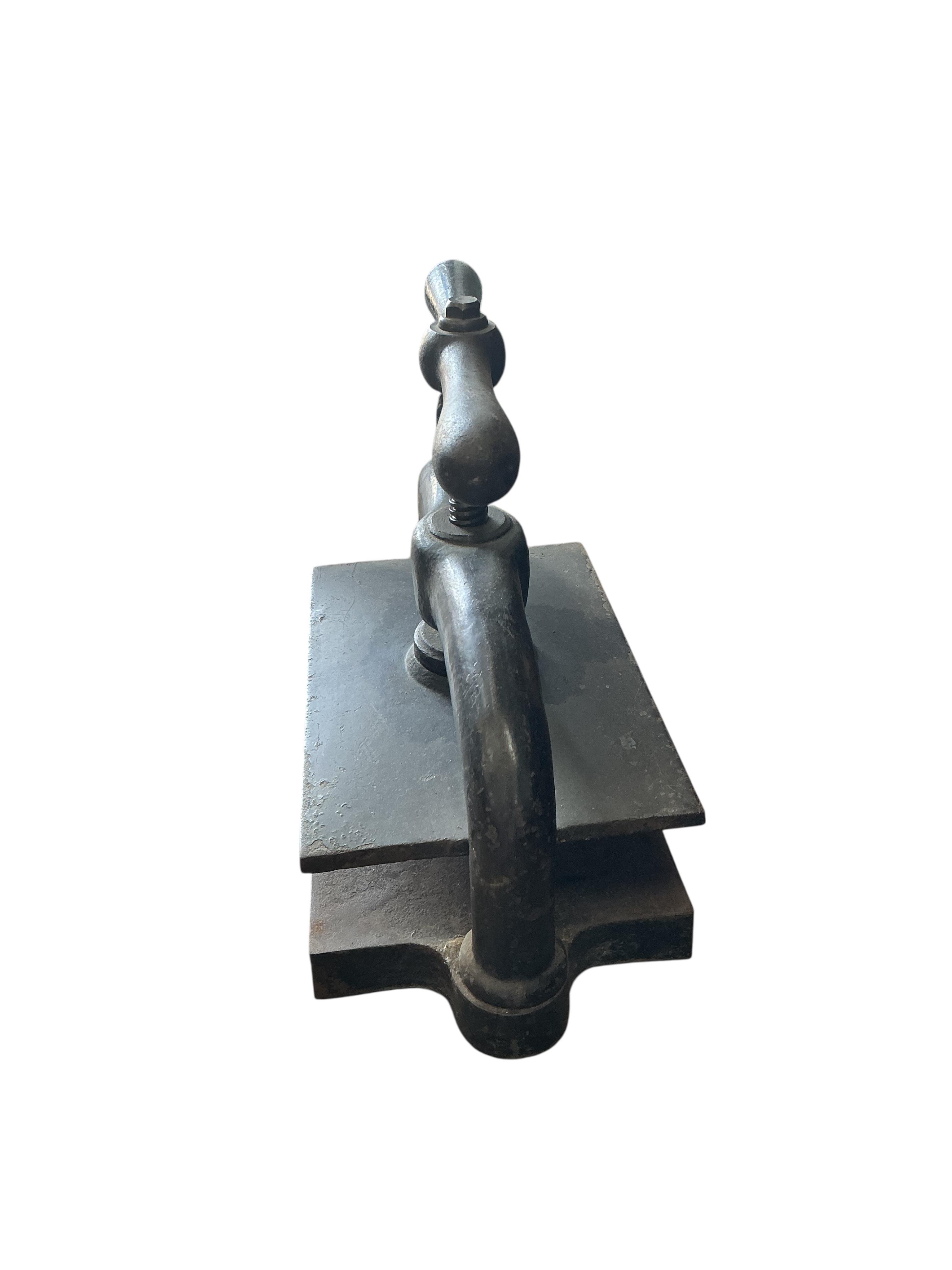 A Victorian cast iron book press, width 48cm, depth 25cm, height 37cm